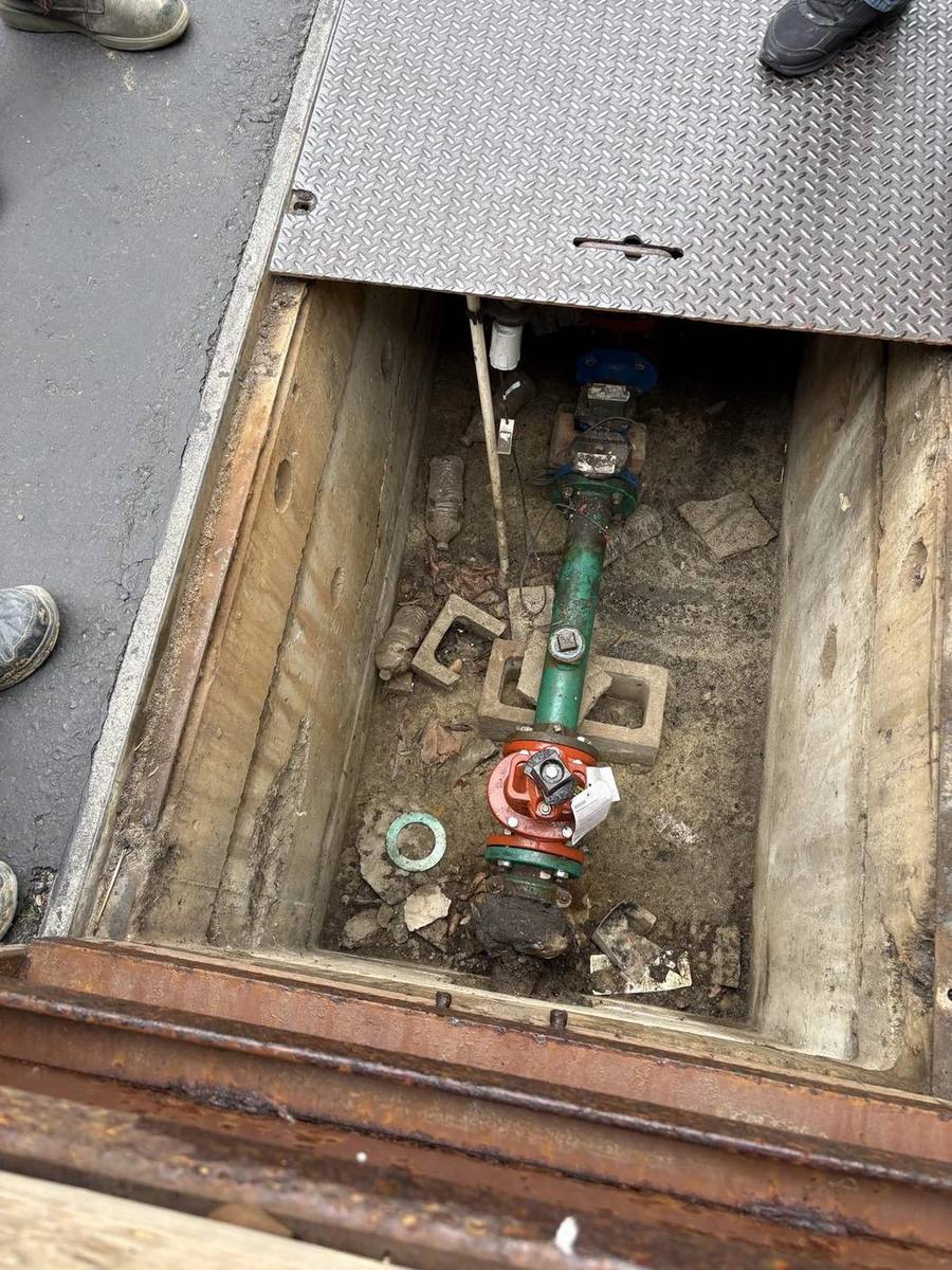 Underground water service vault with new valves and meter set by Viper